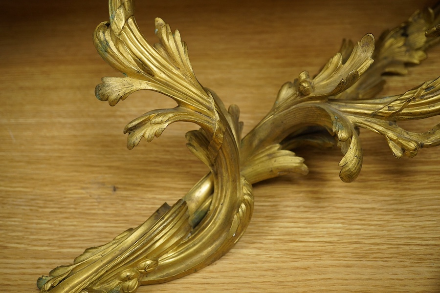 A pair of Rococo style ormolu wall lights, 74cm high. Condition - fair